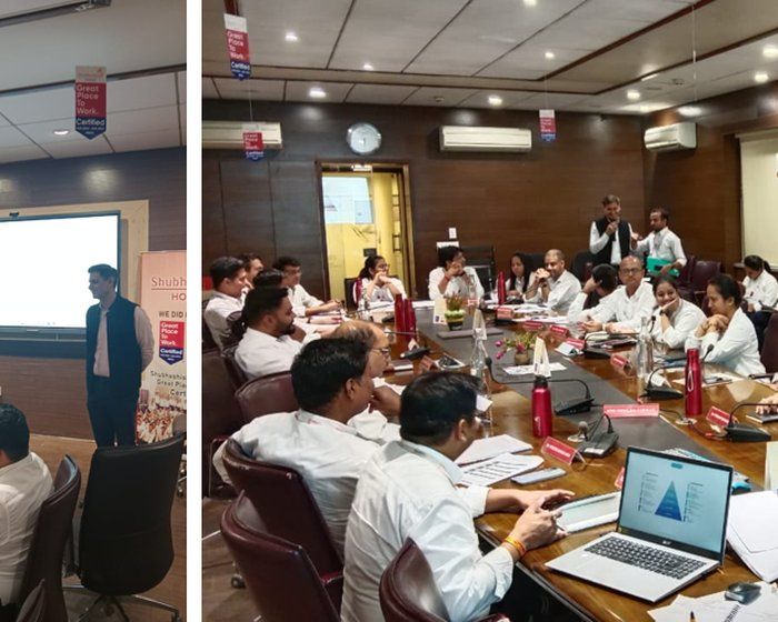 Shubhashish Homes sales framework sessions — podium address and boardroom review