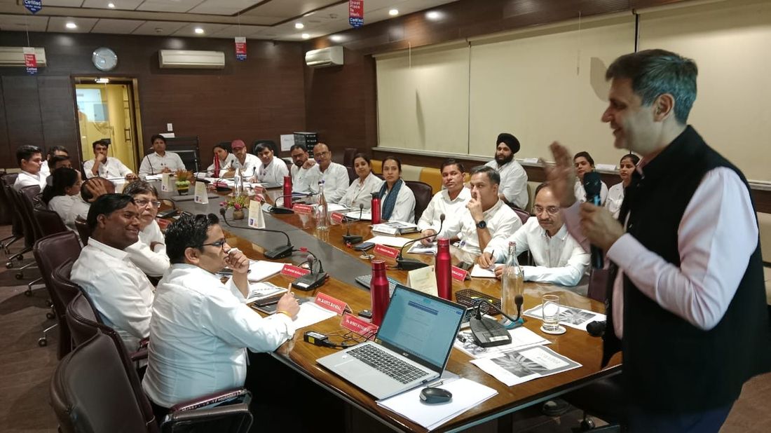 Ybiance leadership training session in a corporate boardroom